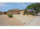 Two-story home with attached garage and desert landscaping at 8136 E Beardsley Rd, Scottsdale, AZ 85255