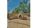 Relaxing outdoor firepit area with flagstone patio at 8136 E Beardsley Rd, Scottsdale, AZ 85255