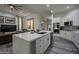 Modern kitchen with white cabinets, quartz countertops and stainless steel appliances at 8136 E Beardsley Rd, Scottsdale, AZ 85255