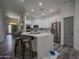 Modern kitchen featuring white cabinets, quartz countertops and stainless steel appliances at 8136 E Beardsley Rd, Scottsdale, AZ 85255