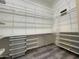 Large walk-in closet with ample shelving and drawer space at 8136 E Beardsley Rd, Scottsdale, AZ 85255