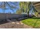 Landscaped backyard with grassy area and stone pathway at 829 E 9Th Pl, Mesa, AZ 85203