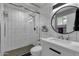 Modern bathroom with white subway tile and a walk-in shower at 829 E 9Th Pl, Mesa, AZ 85203