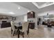 Open dining area with seating for four, adjacent to kitchen at 829 E 9Th Pl, Mesa, AZ 85203