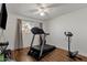 Bright home gym with treadmill, exercise bike, and weights at 829 E 9Th Pl, Mesa, AZ 85203