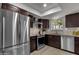 Modern kitchen with stainless steel appliances and granite counters at 829 E 9Th Pl, Mesa, AZ 85203