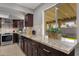 Granite countertop kitchen with stainless steel appliances at 829 E 9Th Pl, Mesa, AZ 85203