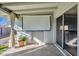 Covered patio with projector screen and outdoor seating at 829 E 9Th Pl, Mesa, AZ 85203