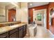 Elegant bathroom with granite countertops, soaking tub, and walk-in shower at 8429 W Sands Ct, Peoria, AZ 85383