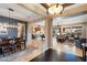 Open concept dining room with views into living room and kitchen at 8429 W Sands Ct, Peoria, AZ 85383