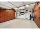 Garage featuring overhead storage and additional cabinets at 8429 W Sands Ct, Peoria, AZ 85383