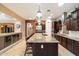 Kitchen features a large granite island, stainless appliances at 8429 W Sands Ct, Peoria, AZ 85383