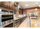 Well-equipped kitchen with stainless steel appliances at 8429 W Sands Ct, Peoria, AZ 85383