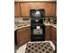 Well-equipped kitchen featuring granite countertops and modern appliances at 9450 E Becker Ln # 1068, Scottsdale, AZ 85260