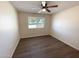 Well-lit bedroom featuring a ceiling fan and window at 9814 N Balboa Dr, Sun City, AZ 85351