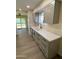 Newly remodeled kitchen with gray cabinets and quartz countertops at 9814 N Balboa Dr, Sun City, AZ 85351