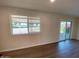 Living room with view and sliding door to patio at 9814 N Balboa Dr, Sun City, AZ 85351