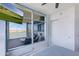 Bedroom with large windows showcasing water views and a balcony at 140 E Rio Salado Pkwy # 506, Tempe, AZ 85281