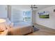 Spacious bedroom with water views and large TV at 140 E Rio Salado Pkwy # 506, Tempe, AZ 85281