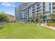 Luxury apartment building with lush green lawn at 140 E Rio Salado Pkwy # 506, Tempe, AZ 85281