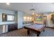 Well-equipped game room with pool table and large screen TV at 140 E Rio Salado Pkwy # 506, Tempe, AZ 85281