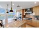 Modern kitchen with a large island and lake view at 140 E Rio Salado Pkwy # 506, Tempe, AZ 85281