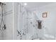 Shower stall with marble tile and white curtain at 14645 N Woods Ln, Florence, AZ 85132