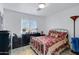 Bedroom with a full-size bed and dark wood dresser at 14645 N Woods Ln, Florence, AZ 85132