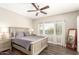 Spacious bedroom with large windows and wood floors at 15225 N 100Th St # 2187, Scottsdale, AZ 85260