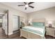 Guest bedroom with mirrored closet doors at 15225 N 100Th St # 2187, Scottsdale, AZ 85260