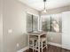 Charming breakfast nook with a table and two stools at 15225 N 100Th St # 2187, Scottsdale, AZ 85260