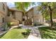 Well-maintained condo building with attractive landscaping and walkways at 15225 N 100Th St # 2187, Scottsdale, AZ 85260