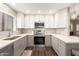 Modern kitchen with stainless steel appliances and gray cabinets at 15225 N 100Th St # 2187, Scottsdale, AZ 85260