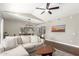 Living room with vaulted ceiling, large window and comfy seating at 15225 N 100Th St # 2187, Scottsdale, AZ 85260