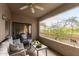 Private patio with seating area and view of trees at 15225 N 100Th St # 2187, Scottsdale, AZ 85260