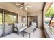 Covered patio with seating area and ceiling fan at 15225 N 100Th St # 2187, Scottsdale, AZ 85260