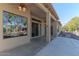 Covered patio with sliding glass doors and ceiling fans at 15938 W Mulberry Dr, Goodyear, AZ 85395