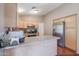 Kitchen with light wood cabinets and stainless steel appliances at 15977 W Latham St, Goodyear, AZ 85338