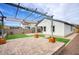 Backyard patio with pergola and artificial turf at 19563 W Annika Dr, Litchfield Park, AZ 85340