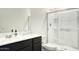 Clean bathroom with a walk-in shower and modern vanity at 19563 W Annika Dr, Litchfield Park, AZ 85340