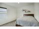 Cozy bedroom with a double bed and window views at 19563 W Annika Dr, Litchfield Park, AZ 85340