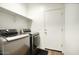Convenient laundry room with washer and dryer included at 19563 W Annika Dr, Litchfield Park, AZ 85340
