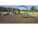 Community park with playground and shaded seating areas at 19563 W Annika Dr, Litchfield Park, AZ 85340