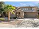 Two-story house with a tile roof, and a three-car garage at 2205 E Taurus Pl, Chandler, AZ 85249