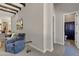 Modern bathroom with a blue vanity, white countertop, and stylish mirror at 2536 E Wood Pl, Chandler, AZ 85249