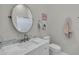 Bathroom with vanity, toilet and large mirror at 2536 E Wood Pl, Chandler, AZ 85249