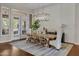 Bright dining room with hardwood floors and access to backyard at 2536 E Wood Pl, Chandler, AZ 85249
