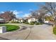 Spacious home with a long driveway and mature trees at 2536 E Wood Pl, Chandler, AZ 85249