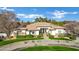 Stunning one-story home with a large front yard and circular driveway at 2536 E Wood Pl, Chandler, AZ 85249