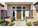 Inviting entryway with a stylish door and stone pillars at 2536 E Wood Pl, Chandler, AZ 85249